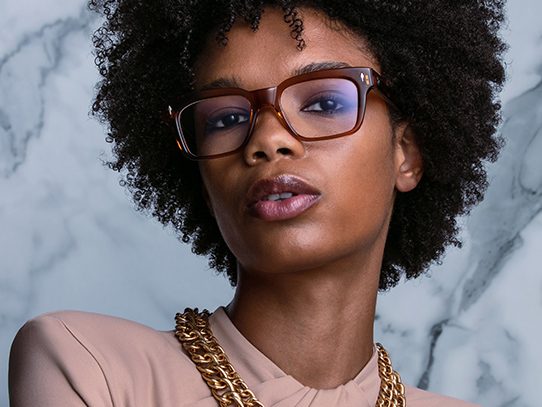 customeyes-homepage-eyewear-brands Black woman wearing eyeglasses